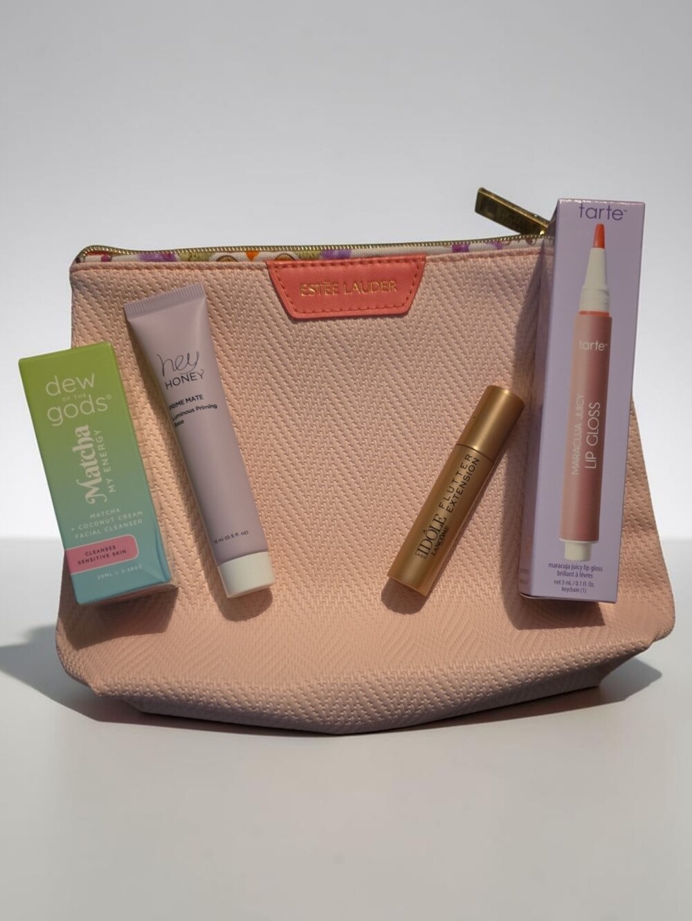 Estee Lauder Pink Textured Makeup Pouch with Assorted Lip & Skincare